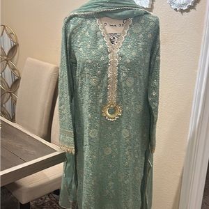 3pcs pakistani dress. Fully embroidered fabric with a touch of gold zari work.